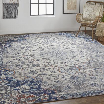 5' X 8' Ivory Gray And Blue Floral Power Loom Distressed Stain Resistant Area Rug