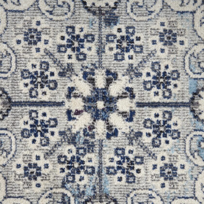 5' X 8' Ivory Gray And Blue Floral Power Loom Distressed Stain Resistant Area Rug