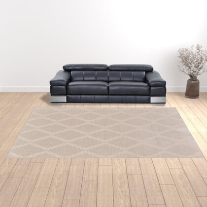10' X 13' Ivory And Tan Geometric Stain Resistant Area Rug