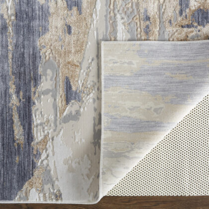 5' X 8' Tan Orange And Ivory Abstract Power Loom Distressed Area Rug