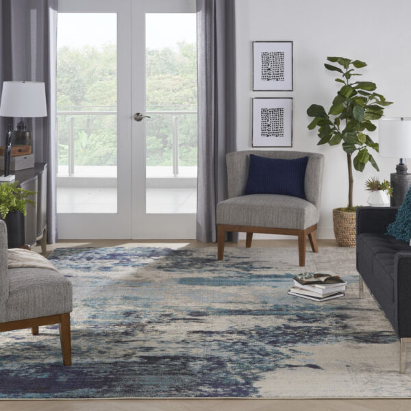 10' x 14' Ivory Abstract Power Loom Area Rug