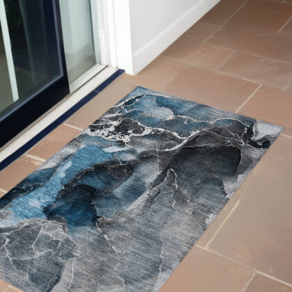 2' X 3' Ivory Blue and Gray Abstract Washable Non Skid Indoor Outdoor Area Rug