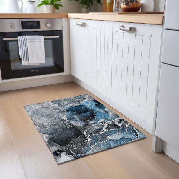 2' X 3' Ivory Blue and Gray Abstract Washable Non Skid Indoor Outdoor Area Rug