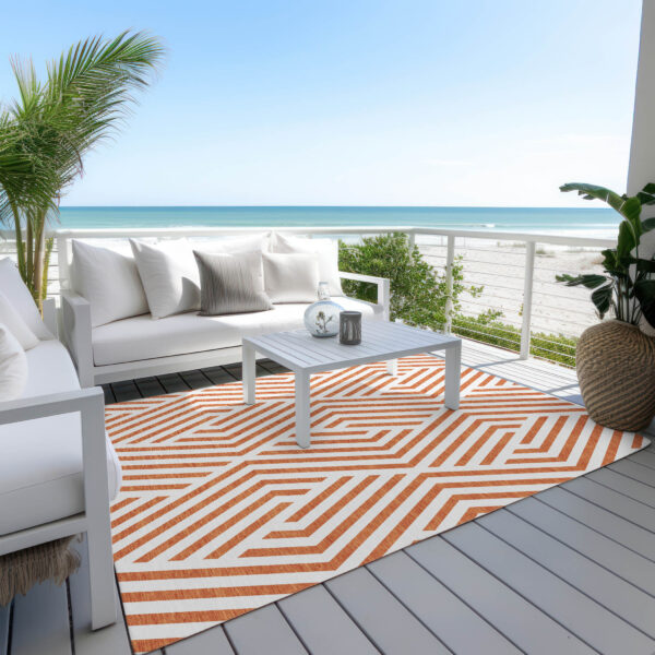 9' X 12' Orange and White Geometric Washable Non Skid Indoor Outdoor Area Rug