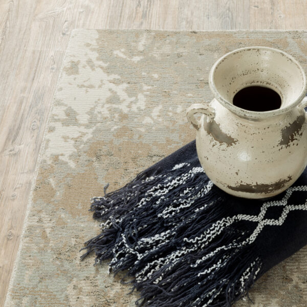 8' X 10' Grey Beige And Ivory Abstract Power Loom Stain Resistant Area Rug