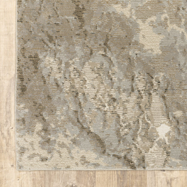 8' X 10' Grey Beige And Ivory Abstract Power Loom Stain Resistant Area Rug