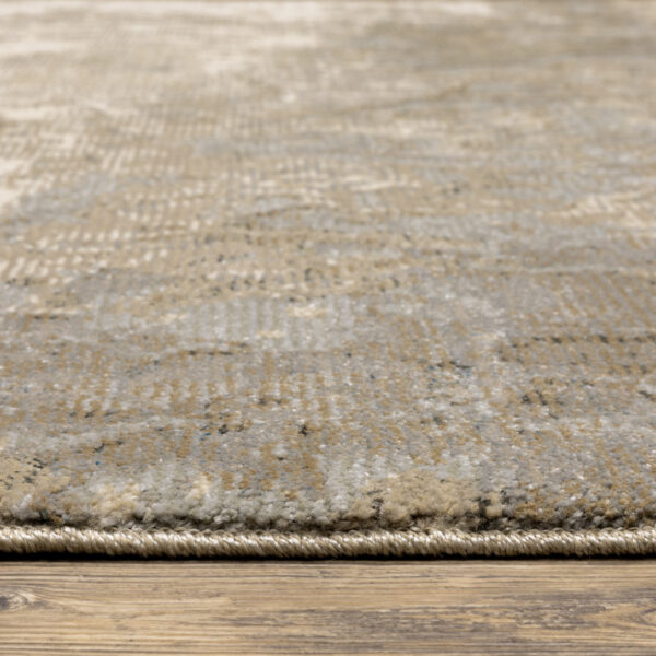 8' X 10' Grey Beige And Ivory Abstract Power Loom Stain Resistant Area Rug