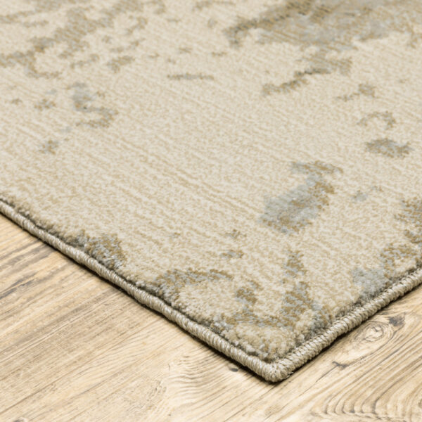 8' X 10' Grey Beige And Ivory Abstract Power Loom Stain Resistant Area Rug