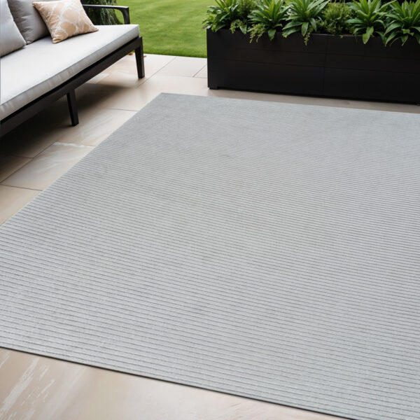 5' X 7' Cream and Beige Striped Distressed Indoor Outdoor Area Rug
