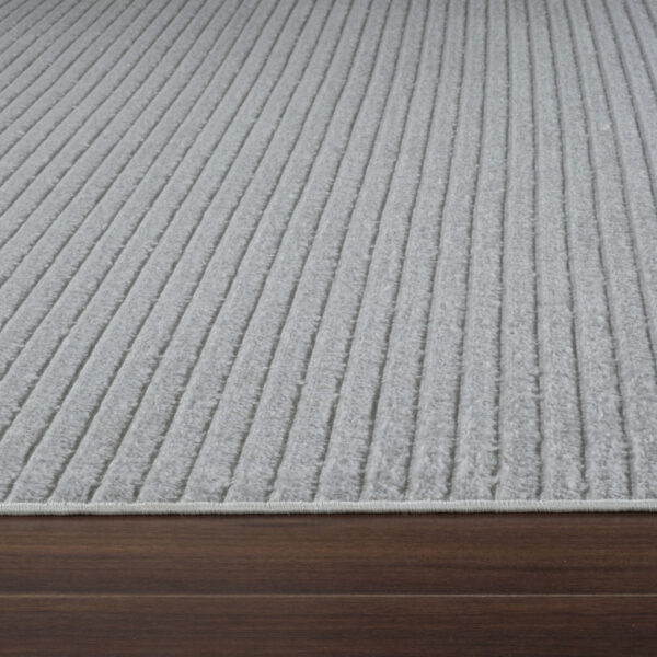 5' X 7' Cream and Beige Striped Distressed Indoor Outdoor Area Rug