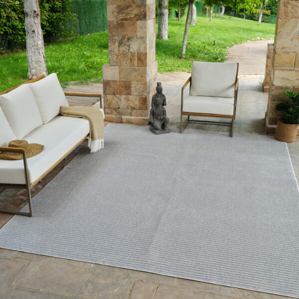 5' X 7' Cream and Beige Striped Distressed Indoor Outdoor Area Rug