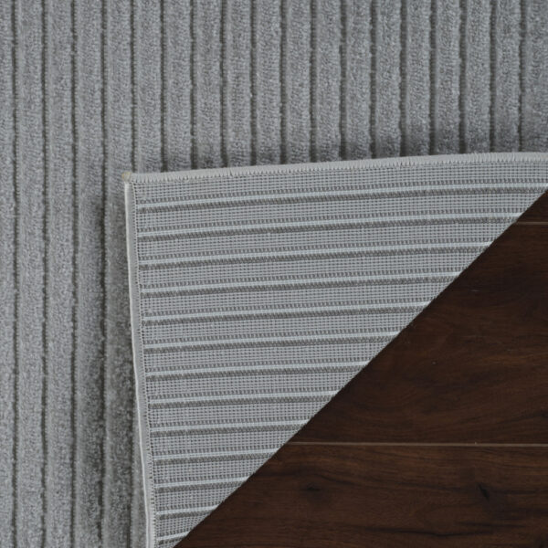 5' X 7' Cream and Beige Striped Distressed Indoor Outdoor Area Rug