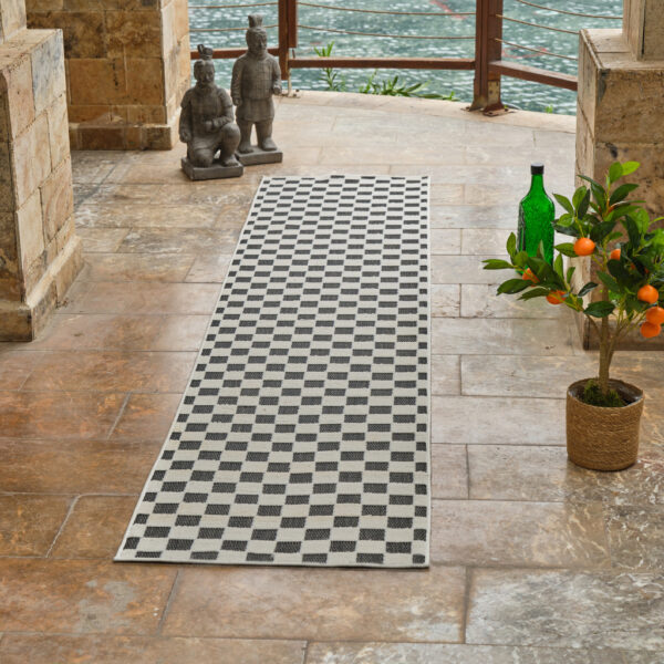10' Black and White Geometric Distressed Indoor Outdoor Runner Rug