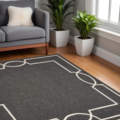 7' Black And White Square Geometric Indoor Outdoor Area Rug