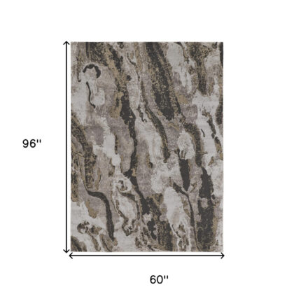 5' x 8' Brown and Ivory Abstract Power Loom Distressed Area Rug
