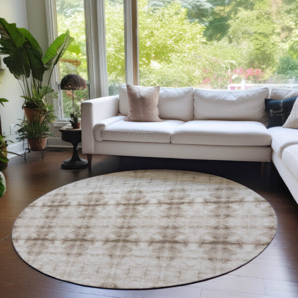 8' Beige Taupe And Tan Round Geometric Washable Indoor Outdoor Area Rug