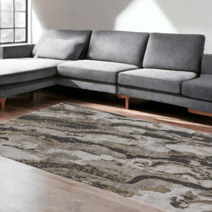 7' x 10' Brown and Ivory Abstract Power Loom Distressed Area Rug