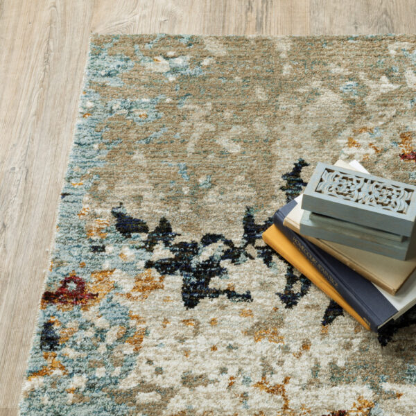 6' X 9' Beige And Blue Abstract Power Loom Stain Resistant Area Rug