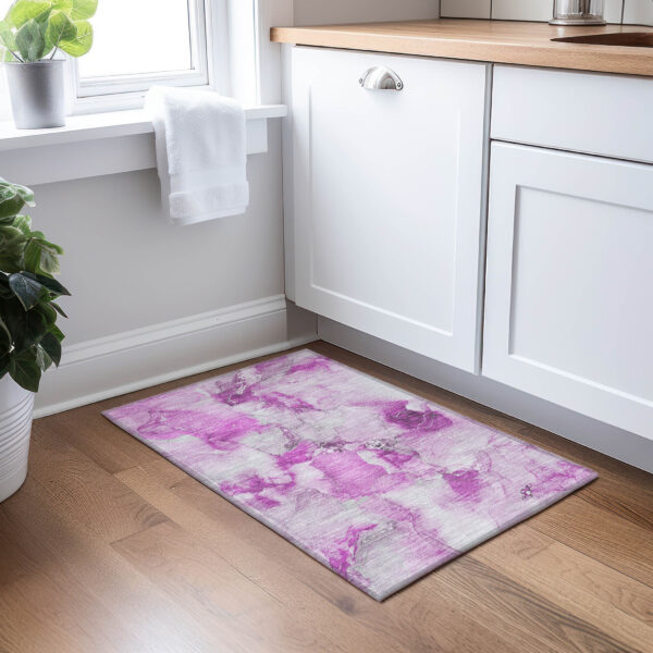 2' X 3' Pink and Ivory Abstract Washable Non Skid Indoor Outdoor Area Rug