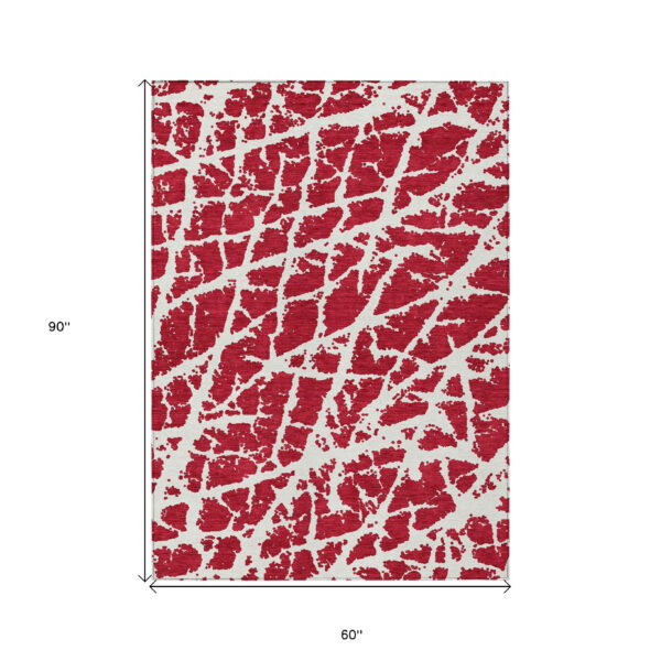 5' X 8' Red and White Abstract Washable Non Skid Indoor Outdoor Area Rug