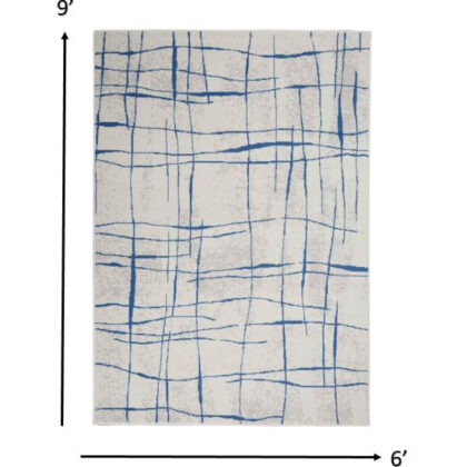 6' X 9' Blue And Ivory Abstract Dhurrie Area Rug