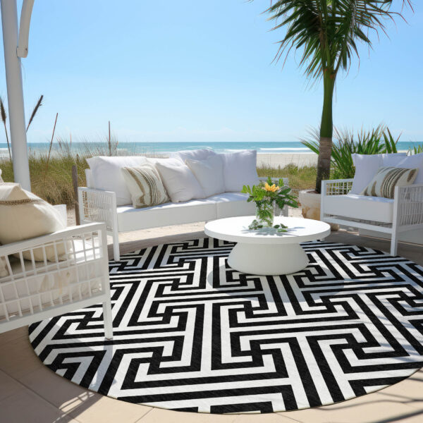 8' Black And Ivory Round Geometric Washable Indoor Outdoor Area Rug
