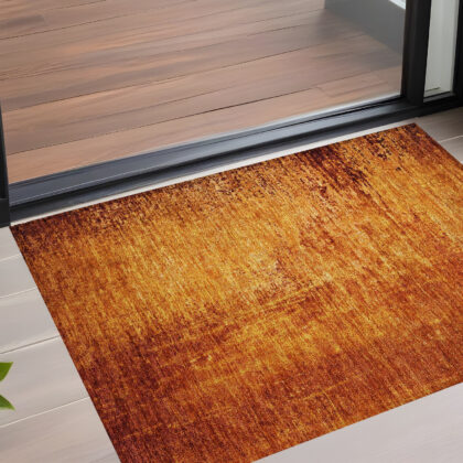 2' X 3' Orange Abstract Washable Non Skid Indoor Outdoor Area Rug