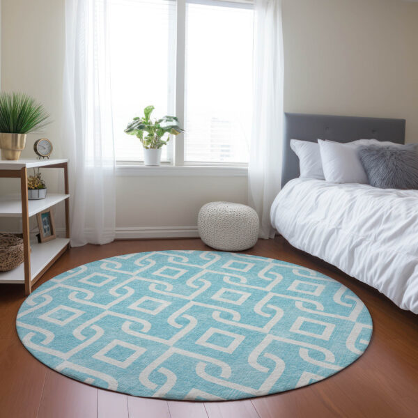 8' Aqua And Ivory Round Geometric Washable Indoor Outdoor Area Rug