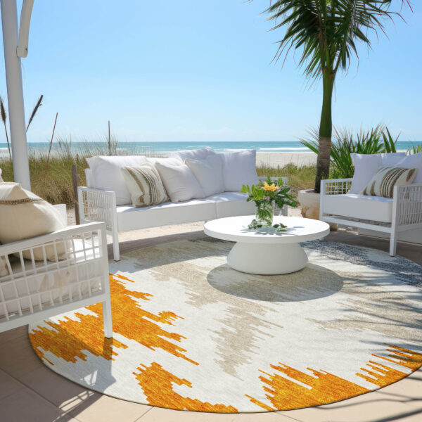 8' Orange Beige And Ivory Round Abstract Washable Indoor Outdoor Area Rug