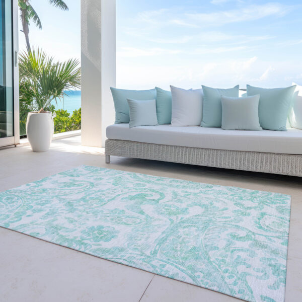 5' X 8' Turquoise And Ivory Paisley Washable Indoor Outdoor Area Rug