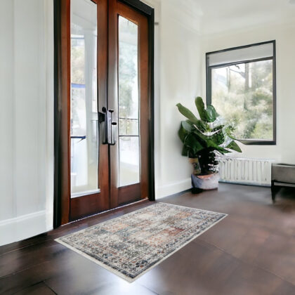 2' x 3' Ivory Blue and Gray Patchwork Distressed Area Rug With Fringe