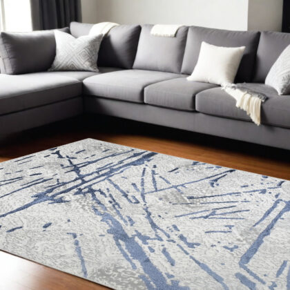 9' x 12' Ivory and Blue Abstract Area Rug