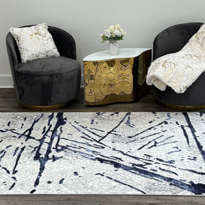 9' x 12' Ivory and Blue Abstract Area Rug