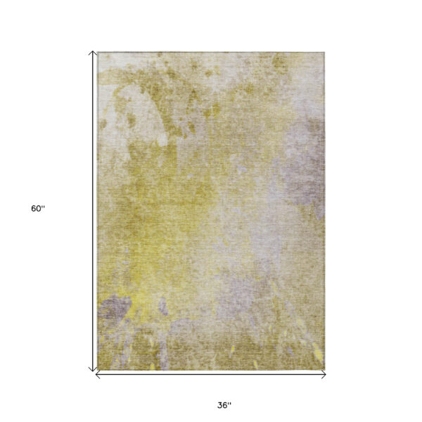 3' X 5' Gold Beige and Purple Abstract Washable Non Skid Indoor Outdoor Area Rug