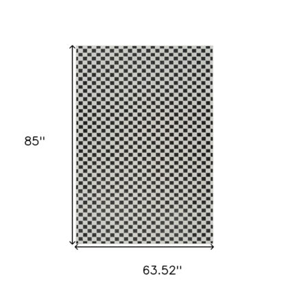 5' X 7' Black and White Geometric Distressed Indoor Outdoor Area Rug