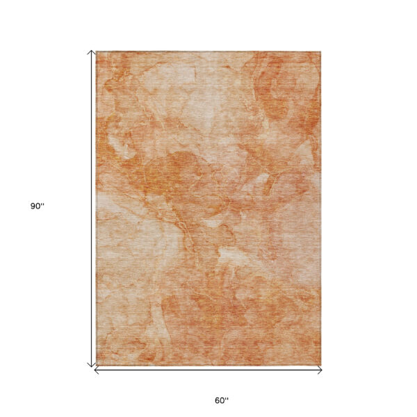 5' X 8' Salmon Peach And Ivory Nautical Washable Indoor Outdoor Area Rug