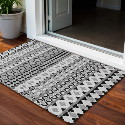 3' X 5' Black Gray And Ivory Quatrefoil Washable Indoor Outdoor Area Rug