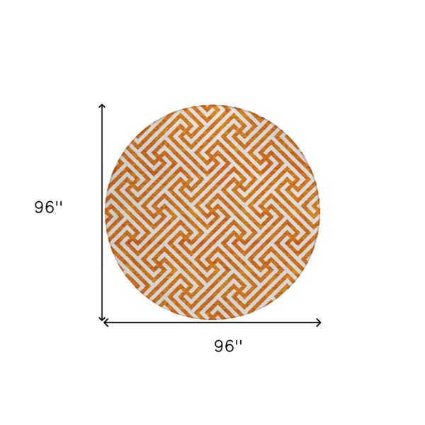 8' Orange And Ivory Round Geometric Washable Indoor Outdoor Area Rug