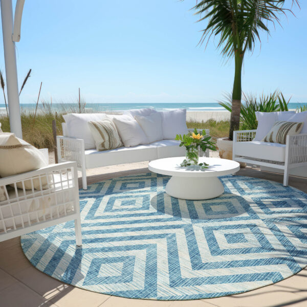 8' Teal Blue And Ivory Round Geometric Washable Indoor Outdoor Area Rug