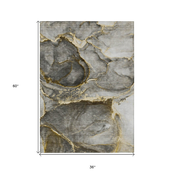 3' X 5' Gray and Gold Abstract Washable Non Skid Indoor Outdoor Area Rug