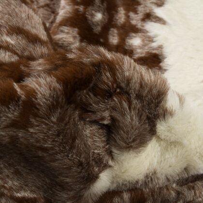 5' X 8' Brown And White Faux Cowhide Area Rug