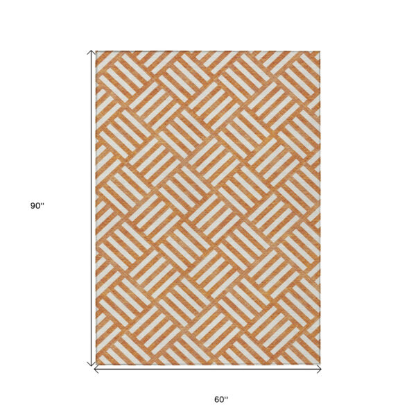 5' X 8' Orange And Ivory Geometric Washable Indoor Outdoor Area Rug