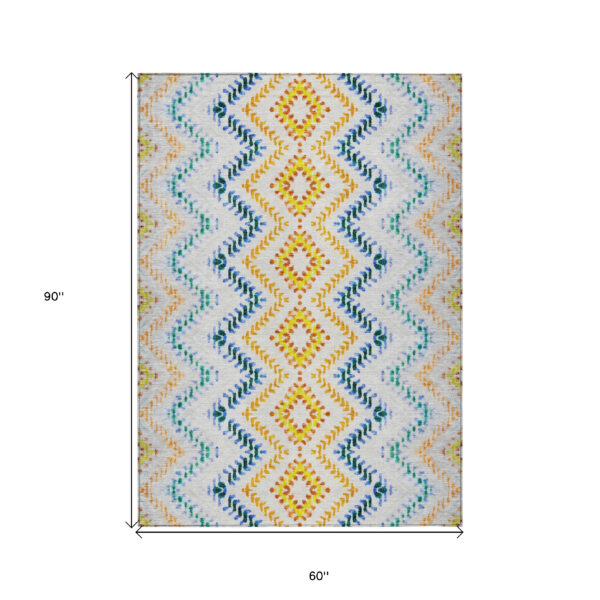 5' X 8' Ivory Blue And Purple Geometric Washable Indoor Outdoor Area Rug
