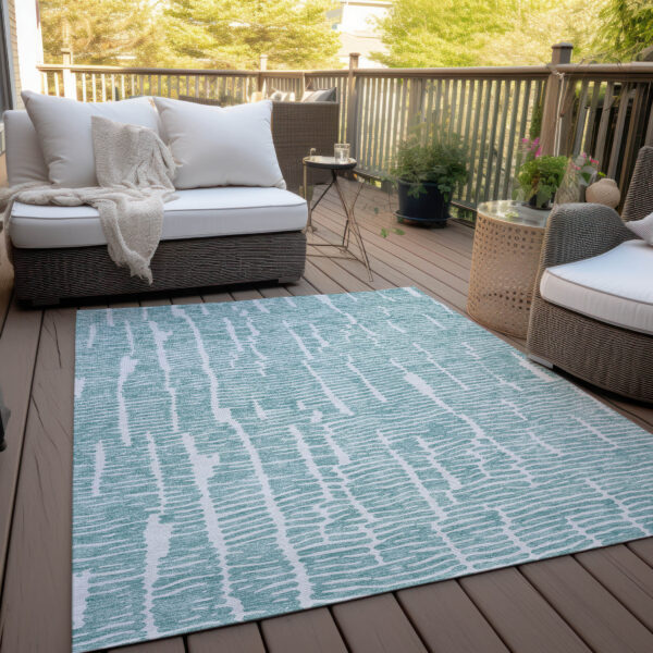 5' X 8' Teal Blue And Ivory Abstract Washable Indoor Outdoor Area Rug