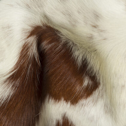 5' x 7' Brown and White Cowhide Hand Knotted Area Rug