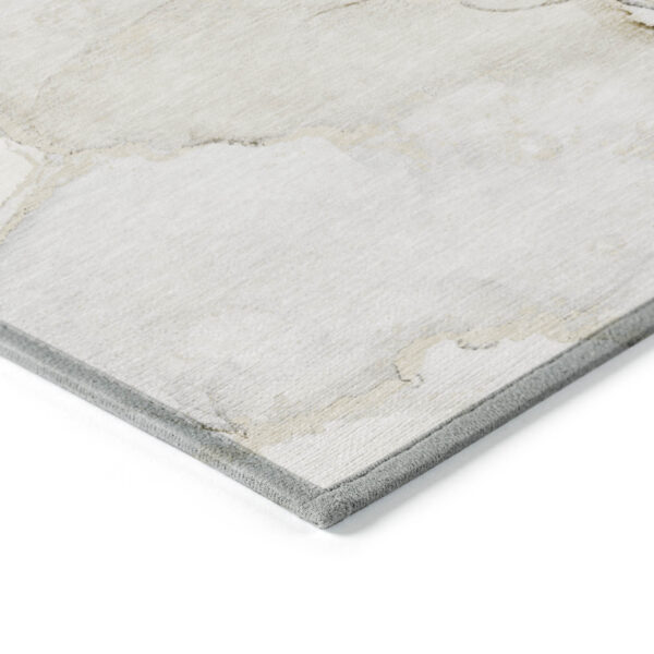 8' X 10' Beige and Ivory Abstract Washable Non Skid Indoor Outdoor Area Rug