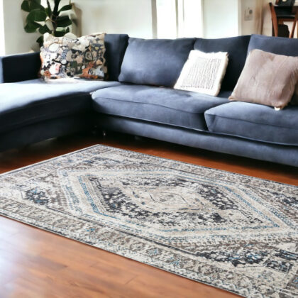 8' x 10' Gray Beige and Blue Geometric Distressed Area Rug With Fringe