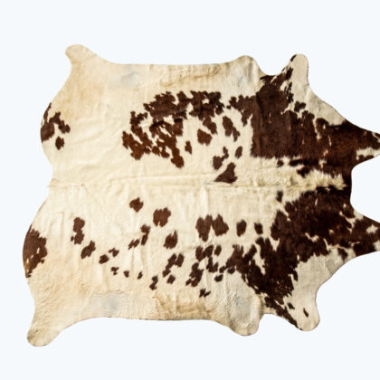 5' x 7' Brown and White Cowhide Hand Knotted Area Rug