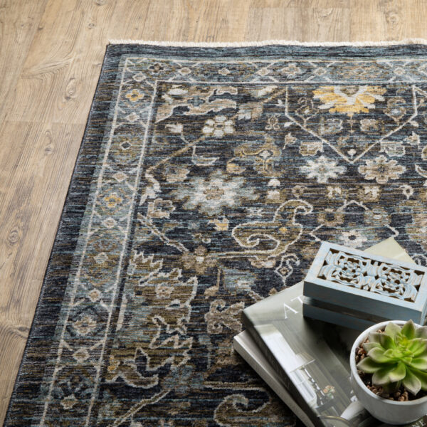 5' X 8' Blue Ivory Grey Gold Green And Brown Oriental Power Loom Stain Resistant Area Rug With Fringe