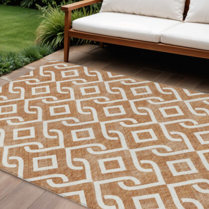 9' X 12' Orange And Ivory Geometric Washable Indoor Outdoor Area Rug
